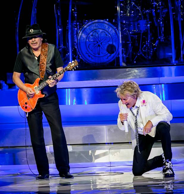 Carlos Santana and Rod Stewart perform “I’d Rather Go Blind” ...