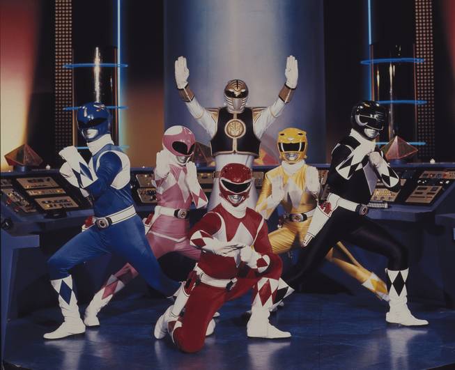 This publicity file photo provided by Saban Brands, shows a scene from the "Mighty Morphin Power Rangers" TV show. Lions Gate Entertainment Corp. said Tuesday, May 6, 2014, it was partnering with Haim Sabanís Saban Entertainment to produce a live-action feature film based on the spandex-wearing, martial arts superheroes who are usually called upon to save the world. "Power Rangers" have had a continuous presence on U.S. TV since 1993.