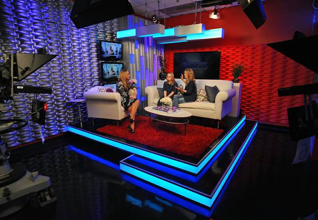 Fox 5 personality Rachel Smith, left, interviews guests Michelle, from Opportunity Village, center, and Las Vegas performer Veronic DiCaire in the KVVU studios while taping a segment discussing Veronic's new program "Lend Your Voice" on Thursday afternoon.