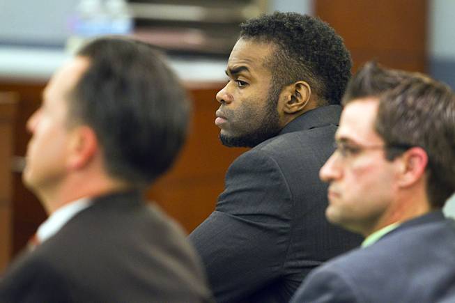 Jason Omar Griffith, center, appears in court during his trial at the Regional Justice Center Thursday, May 8, 2014. Griffith is accused of murdering Luxor "Fantasy" dancer Deborah Flores Narvaez in December 2010.
