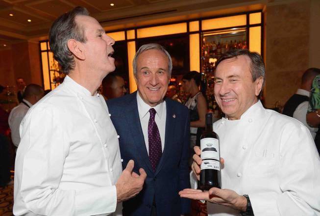 Thomas Keller, Larry Ruvo and Daniel Boulud attend the grand opening of DB Brasserie by chef Boulud on Thursday, May 8, 2014, at the Venetian.