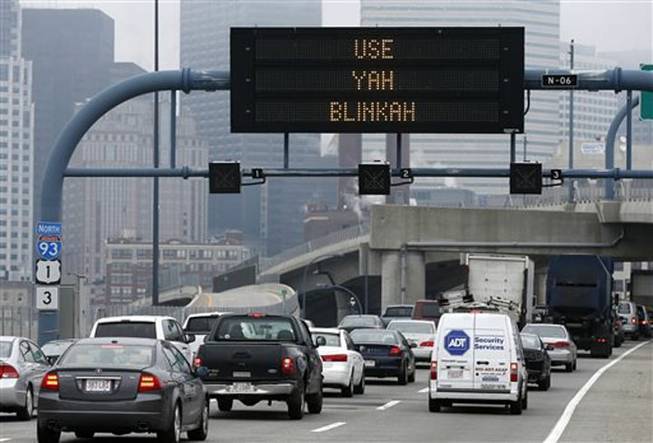 An electronic highway sign is seen on Interstate 93 in Boston on Friday, May 9, 2014. The Massachusetts Department of Transportation posted the message "Changing Lanes? Use Yah Blinkah" on signs around the city. "Blinkah" is how Bostonians pronounce "blinker."