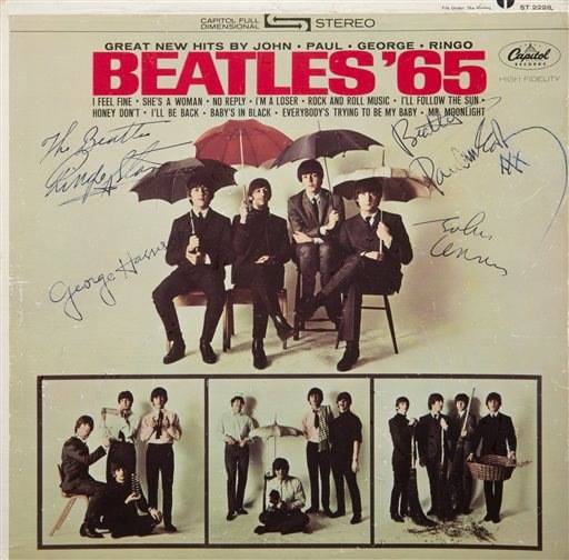 This undated photo provided by Julien's Auctions shows a “Beatles ’65” album signed by all four members of the band. It could bring up to $300,000 on May 17, 2014 during a rock memorabilia sale by Julien’s Auctions at the Hard Rock Cafe in New York.