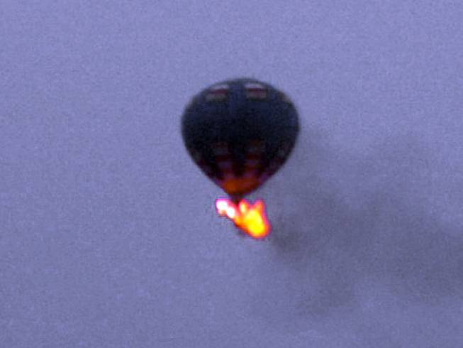This photo provided by Nancy Johnson shows what authorities say is a hot-air balloon that was believed to have caught fire and crashed in Virginia, Friday, May 9, 2014. 