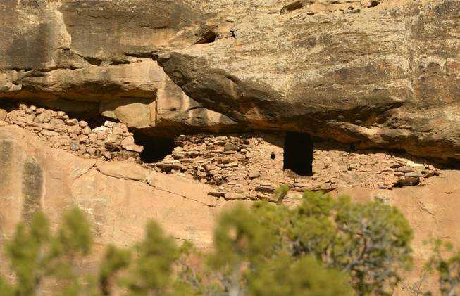 In this April 24, 2014, photo, Pueblo III-period cliff dwellings created by the Anasazi or Ancestral Puebloan peoples between 1150 and 1300 A.D. are seen in Recapture Canyon near Blanding, Utah. The Bureau of Land Management closed it to motorized use in 2007. Environmentalists and Native Americans say the ban is needed to preserve the fragile artifacts.