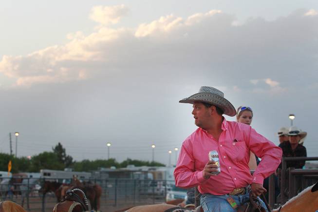 Jason Taylor looks over his shoulder during the Bighorn Rodeo Saturday, May 10, 2014. The Bighorn Rodeo is an annual event put on by the Nevada Gay Rodeo Association.
