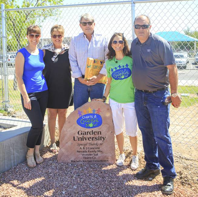 From left: Julie Sanders-Kolter- Volunteer Chair and Nutritionist for Extraordinary Lifestyles Candace Maddin, co-founder and president of Create A Change Now Mike Sherwood- President of Nevada Ready Mix Melissa Blynn, Chief Operating Officer for Create A Change Now.Drew from J.A. Tibertil Co were onsite at Lunt Elementary for the unveiling of the school's edible garden, Garden University on Friday, May 2, 2014.