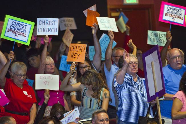 Christ Church Episcopal members cheer as they are introduced during the Nevadans for the Common Good  second community convention gathering at the Cashman Center on Tuesday, May 13, 2014.