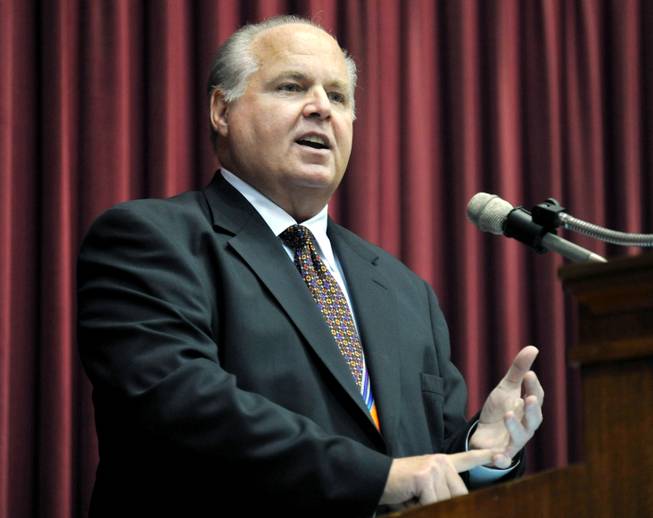 This May 14, 2012, file photo shows conservative commentator Rush Limbaugh speaking during a ceremony inducting him into the Hall of Famous Missourians in the state Capitol in Jefferson City, Mo. 