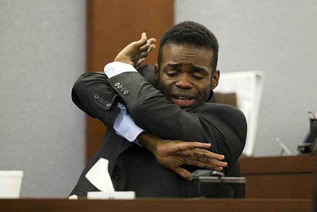 Defendant Jason Omar Griffith describes a struggle with his ex-girlfriend as he testifies in his own defense during his trial at the Regional Justice Center in Las Vegas Thursday, May 15, 2014.