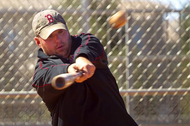 Sam Lopaze bats during a casual Winder Farms baseball game at Red Ridge Park Sunday, May 11, 2014.