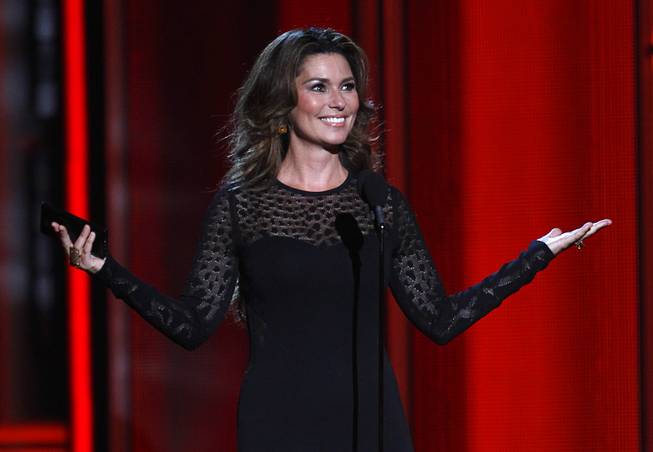 Shania Twain introduces the nominees for Top Rock Album during the 2014 Billboard Music Awards at MGM Grand Garden Arena on Sunday, May 18, 2014. Twain announced Monday, July 21, 2014, that her two-year residency at Caesars Palace will wrap up in December.