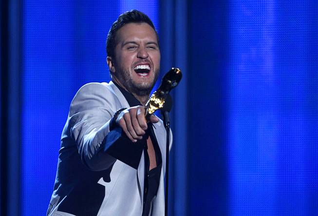 Luke Bryan accepts the award for Top Country Artist during the 2014 Billboard Music Awards on Sunday, May 18, 2014, at MGM Grand Garden Arena.