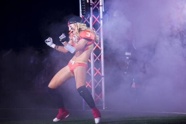 Kelly Campbell, of the Las Vegas SIN, makes her enterance on the field before going against Green Bay Chill, Thursday May 15, 2014. The SIN beat Green Bay 34 to 24 at Thomas & Mack Center, their first win of the Legends Football League season.