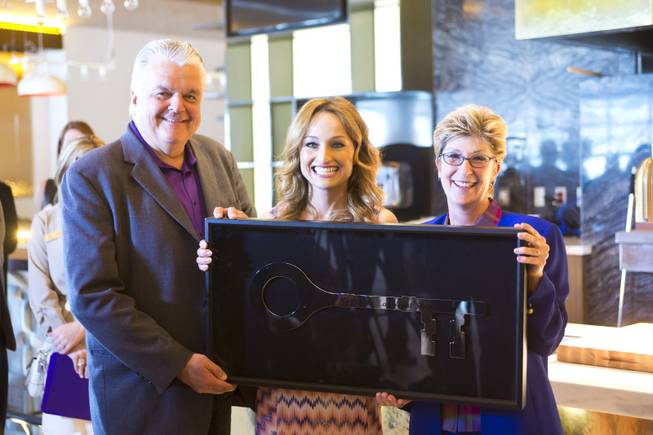 Clark Counry Commissioners Steve Sisolak and Chris Giunchigliani present Giada De Laurentiis with The Key to the Las Vegas Strip during the ribbon-cutting ceremony at The Cromwell, Wednesday May 21, 2014. The Cromwell is the first stand-alone boutique hotel located on the Las Vegas Strip.