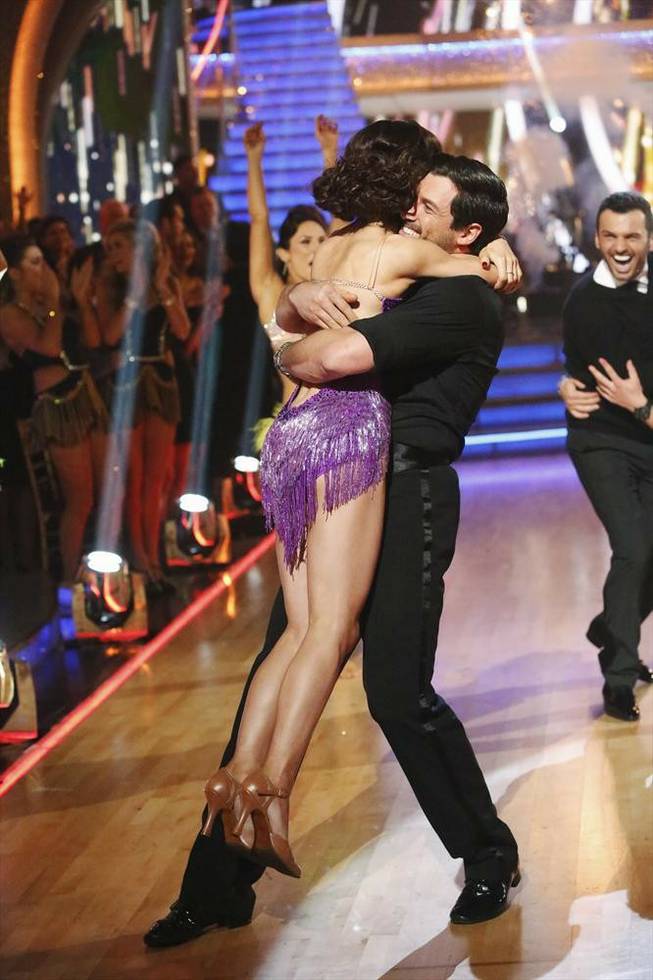 Maksim Chmerkovskiy and ice dancer Meryl Davis celebrate their Season 18 victory on ABC’s “Dancing With the Stars” on Tuesday, May 20, 2014. 