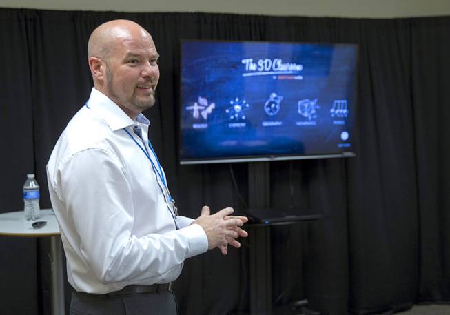 Mattias Bostrom, Sensavis director of product development, prepares to give a demonstration of Sensavis 3D educational software in Las Vegas Wednesday, May 21, 2014. Sensavis, a Swedish education company, is promoting their "3D classroom," which allows students to interact with subjects like human anatomy, math, science and geography in a realistic virtual environment.