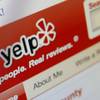 This March 17, 2010, file photo shows the Yelp website on a computer screen in Los Angeles. 