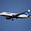 A JetBlue Airbus 320 descends for a landing at Reagan National Airport in Washington, Sunday, June 24, 2012.