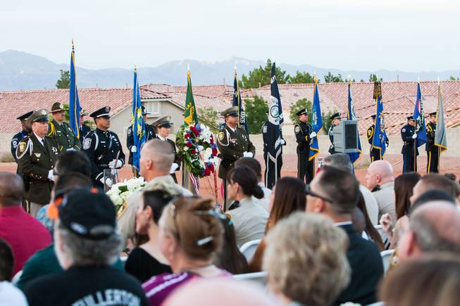 The Nevada Honor Guard presents the colors of each law enforcement agency being honored during the Southern Nevada Law Enforcement Memorial ceremony at Police Memorial Park in Las Vegas Thursday, May 22, 2014.