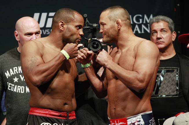 Daniel Cormier and Dan Henderson face off during the weigh-in for UFC 173 Friday, May 23, 2014, at the MGM Grand Garden Arena.