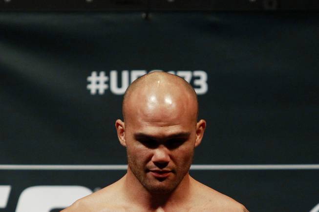 Robbie Lawler stands on the scale during the weigh in for UFC 173 Friday, May 23, 2014 at the MGM Grand Garden Arena.