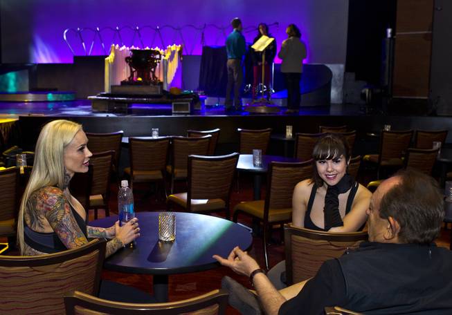 Sabina Kelley and Claire Sinclair chat with Robin Leach during a break in rehearsals for "Pin Up" at the Stratosphere Theater on Friday, May 23, 2014.