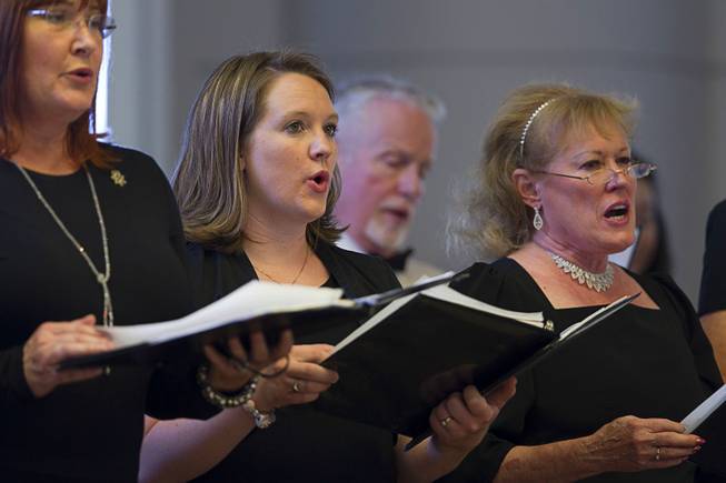 Members of the Nevada Opera Theater Chorus perform during a Memorial Day ceremony at the Southern Nevada Veterans Memorial Cemetery in Boulder City Monday, May 26, 2014.