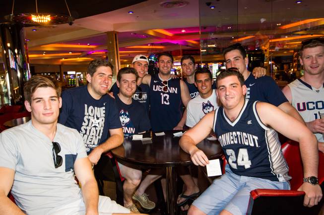 On Saturday, May 24, 2014, graduates of the University of Connecticut stopped by the Hard Rock Hotel Las Vegas to pick up their winnings: a total of $60,000. From left: Paul Delvecchio, Andrew Zielinski, John Mitkevicius, Tom Andreoli, Harrison Fuchs, Dan Stewart, Patrick Charmel, Marc Demattie, Dave Faenza and Michael Price at the Hard Rock sports book.