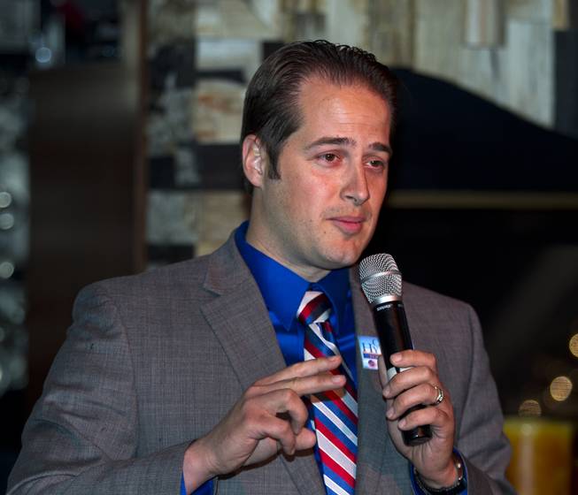 Governor candidate Chris Hyepock introduces his platform to Libertarian party members and guests during a meet and greet session at Hyde in the Bellagio on Thursday, May 29, 2014.