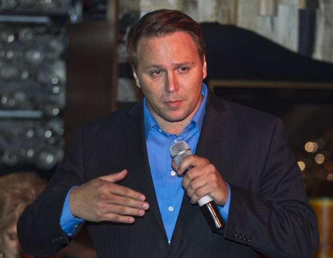 State Senate District 20 candidate Carl Bunce introduces his platform to Libertarian party members and guests during a meet and greet session at Hyde in the Bellagio on Thursday, May 29, 2014.