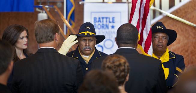 Buffalo Soldiers present the colors as the United States Postal Service and the Nevada Sesquicentennial Commission unveil the Nevada Sesquicentennial commemorative stamp at the Smith Center on Thursday, May 29, 2014.