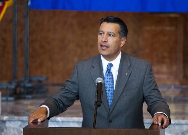 Governor Brian Sandoval shares his love of Nevada  during the unveiling ceremony of the Nevada Sesquicentennial commemorative stamp at the Smith Center on Thursday, May 29, 2014.