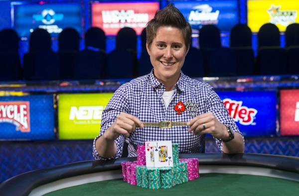 Vanessa Selbst poses with the bracelet she won in the $25,000 buy-in mixed-max no-limit hold'em tournament at the 2014 World Series of Poker.