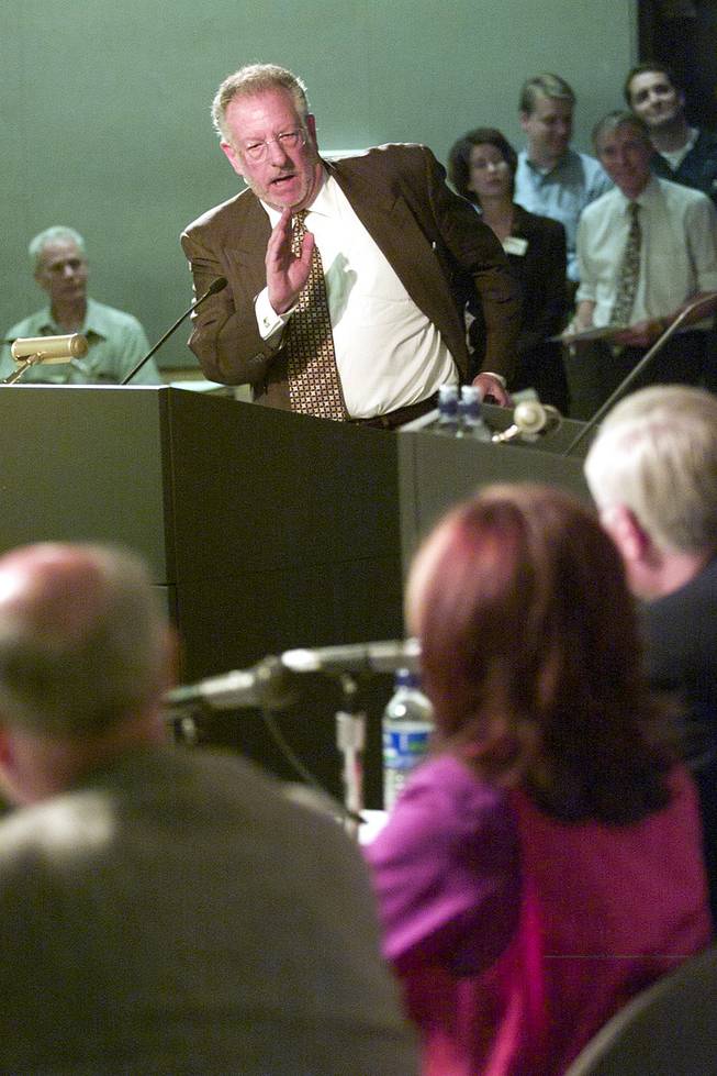 Mayor Oscar Goodan addresses representatives from the Department of Energy during the DoE's public hearing on the proposed Yucca Mountain Repository Sept. 5, 2001. Goodman vowed that Yucca Mountain would not be built while he was mayor.