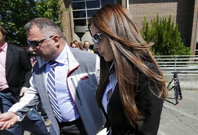 Kerri Kasem, the daughter of ailing radio personality Casey Kasem, leaves Kitsap County Courthouse on Friday, May 30, 2014, in Port Orchard, Wash. 