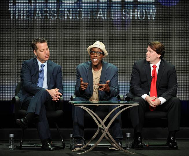 In this July 29, 2013, file photo, from left, executive producer Neal Kendall, host/executive producer Arsenio Hall and executive producer John Ferriter participate in the "The Arsenio Hall Show" panel at the 2013 CBS Summer TCA Press Tour at the Beverly Hilton Hotel in Beverly Hills, Calif.