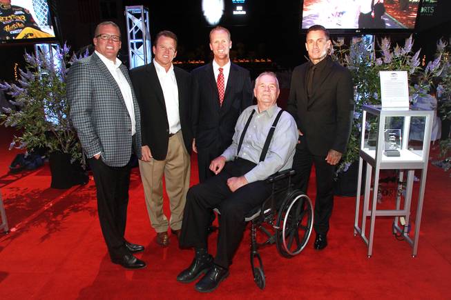 From left, Troy Herbst, Tim Herbst, Chris Riley, Ken Black and Carey Hart pose for a group photo during the induction for the Southern Nevada Sports Hall of Fame Friday, May 30, 2014.