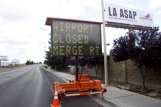 A sign indicating the closure of McCarran International Airport is seen Tuesday, Sept. 11, 2001.
