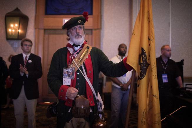 William Temple, a Tea Party activist, listens to Louisiana governor Bobby Jindal speak at the Republican Leadership Conference in New Orleans, May 29, 2014. After establishment candidates won a series of primaries this year, Republican leaders are considering tough tactics to head off further attacks from the Tea Party.(Edmund D. Fountain/The New York Times)