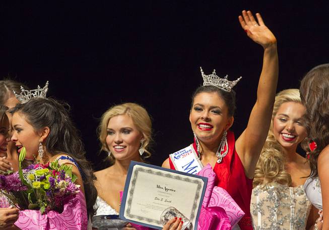 Ellie Smith, right, of Henderson waves after being crowned 2014 Miss Nevada at the Miss Nevada and Miss Nevada Outstanding Teen Pageant at the Las Vegas Academy Theater Sunday, June 1, 2014. Her sister Amy Smith, left, was crowned 2014 Miss Nevada Outstanding Teen.