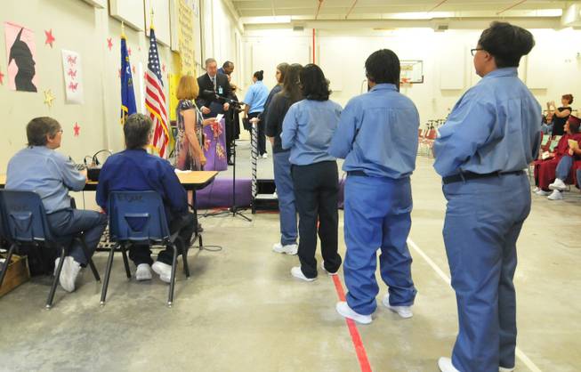 The Clark County School District recognized more than 70 inmates at the Florence McClure Women's Correctional Center who graduated from the district's adult education program with high school diplomas, GEDs and vocational certificates on Tuesday, June 3, 2014.
