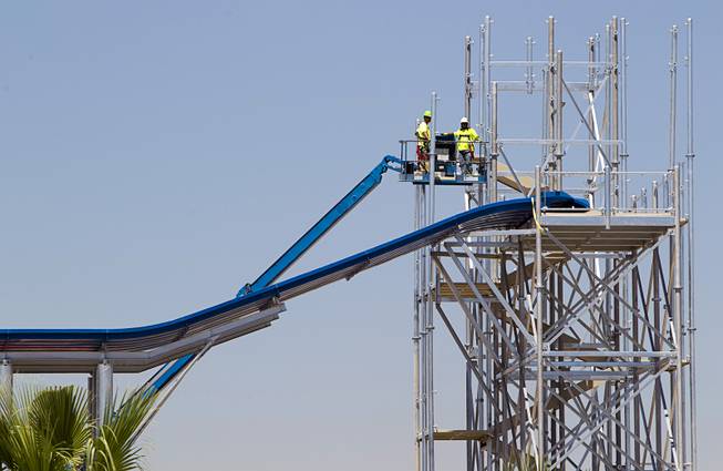 Construction continues on a water slide at the Cowabunga Bay water park in Henderson Thursday, June 5, 2014. Developers announced that the water park will open July 4. The park includes a 32,000-square-foot wave pool, water slides and a 1,200-foot-long lazy river.