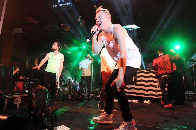 Macklemore performs during Surrender and Encore Beach Club’s fourth-anniversary celebration ...