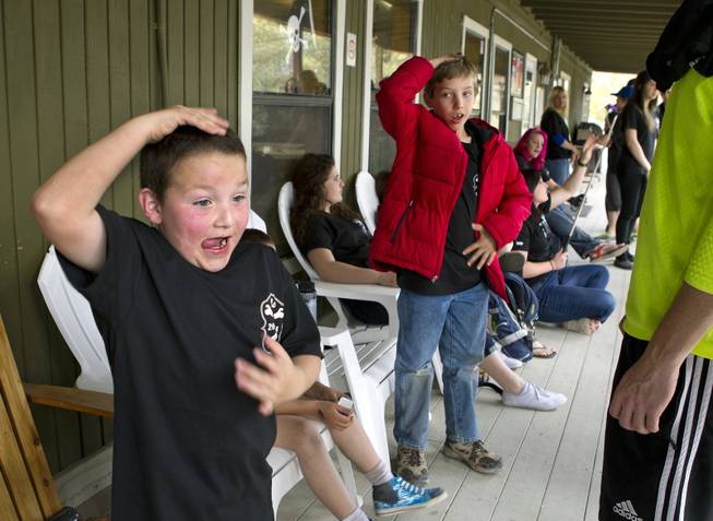 Camper Carter Davidson, 8, pats his head and rubs his tummy during a game at Camp Vegas within Pitosi Pines sponsored by the Nevada Diabetes Association Tuesday, April 15, 2014.