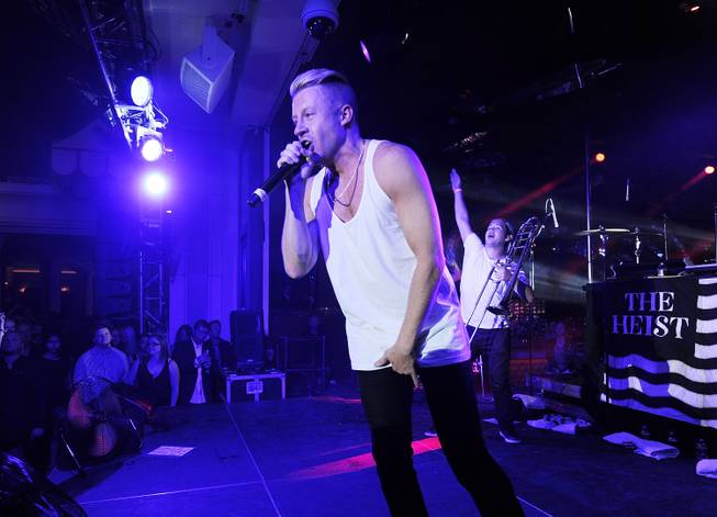Macklemore performs during Surrender and Encore Beach Club’s fourth-anniversary celebration ...