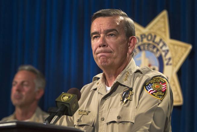 Sheriff Doug Gillespie takes questions during a news conference at Metro headquarters following the death of two officers and a citizen Sunday, June 8, 2014. Two suspects, also dead, shot two Metro Police officers at CiCi's Pizza on Nellis Boulevard, then fled to a nearby Wal-Mart, where they shot and killed another person.