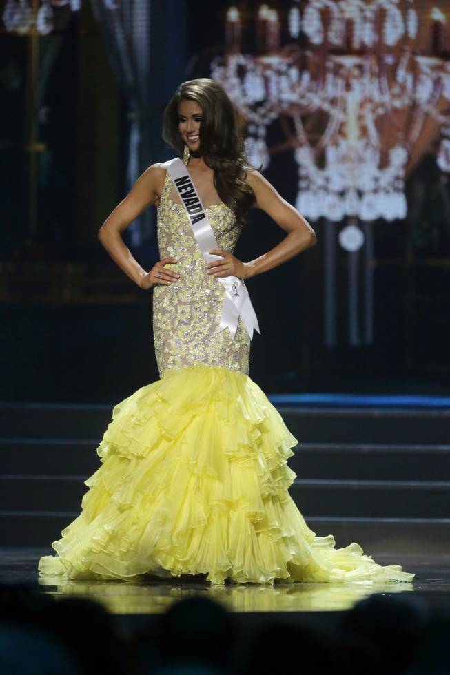 Miss Nevada USA Nia Sanchez participates in the evening gown competition during the 2014 Miss USA preliminary competition in Baton Rouge, La., on Wednesday, June 4, 2014.