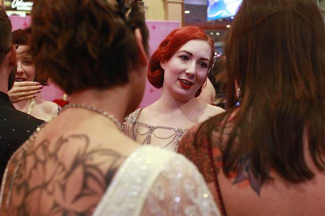 Attendees mingle in the lobby before the 2014 Burlesque Hall of Fame's Tournament of Tease competition Saturday, June 7, 2014 at the Orleans.