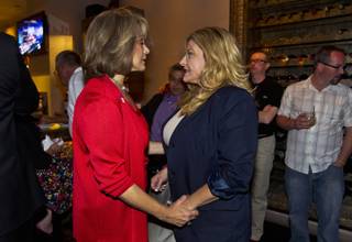 Lieutenant Governor candidate Sue Lowden shares a few words with Assemblywoman Michele Fiore as Republicans gather at Mundo restaurant on Monday, June 9, 2014.